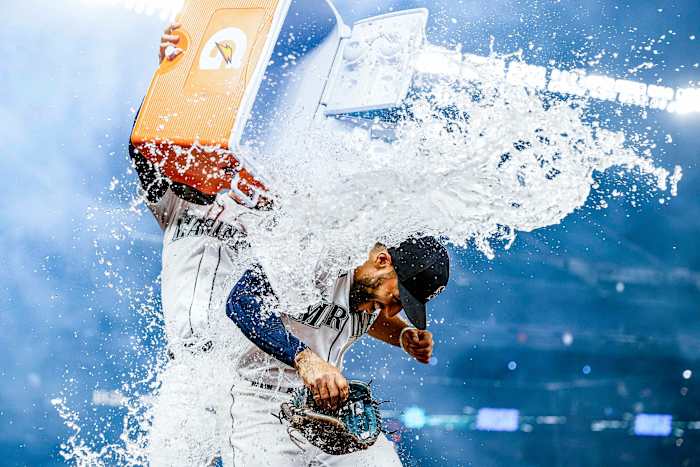 Abraham Toro gets dosed with a cooler of water after hitting a game-winning grand slam off Astros reliever Kendall Graveman on Aug. 31. The Mariners traded Graveman for Toro just over a month earlier.